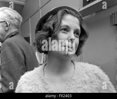 Woman smoking cigar Britain 1960s 1967 Stock Photo