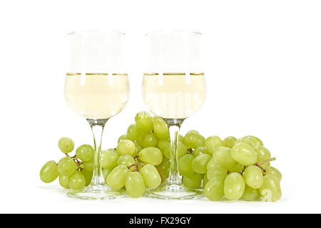 White wine and green grapes isolated on white Stock Photo