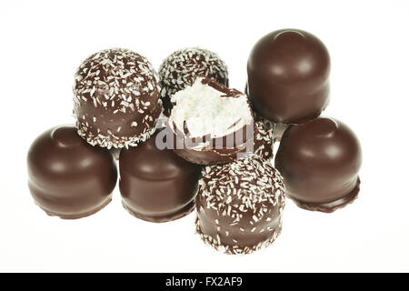 Chocolate coated marshmallow treats isolated on white Stock Photo