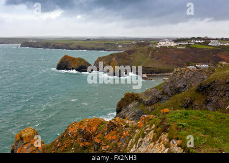 Heavy winter seas at the harbour entrance to Mullion Cove on the Lizard Peninsula, Cornwall, England, UK Stock Photo