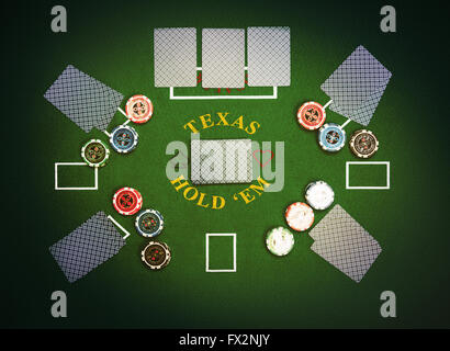 Poker cards and chips lying on green poker cloth Stock Photo