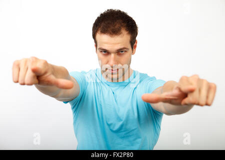 Choice or pick concept - cool young man pointing towards you Stock Photo