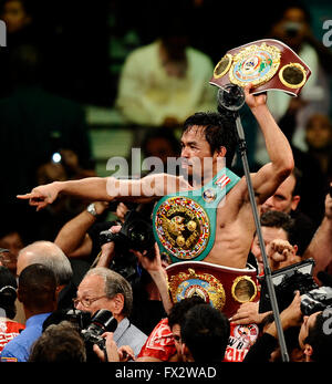 File. 9th Apr, 2016. MANNY PACQUIAO (58-6-2) retires after beating Timothy Bradley by unanimous decision. The Filipino superstar had a 21 year career becoming the first and only eight-division world champion, in which he has won ten world titles, as well as the first to win the lineal championship in four different weight classes. According to Forbes, he was the 2nd highest paid athlete in the world as of 2015. Pictured: Nov 14, 2009 - Las Vegas Nevada, USA. Manny Pacquiao talks during a press conference after his win over Miguel Cotto at the MGM Grand Hotel as Manny Pacquiao is the first Stock Photo