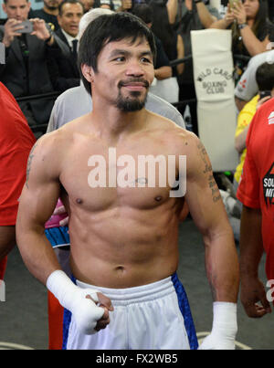 File. 9th Apr, 2016. MANNY PACQUIAO (58-6-2) retires after beating Timothy Bradley by unanimous decision. The Filipino superstar had a 21 year career becoming the first and only eight-division world champion, in which he has won ten world titles, as well as the first to win the lineal championship in four different weight classes. According to Forbes, he was the 2nd highest paid athlete in the world as of 2015. Pictured: March 30, 2016. Hollywood CA. Manny Pacquiao works out with his trainer Freddie Roach on his upcoming fight with Timothy Bradley Wednesday. The two will be fighting each ot Stock Photo