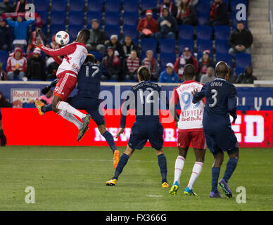 Harrison, New Jersey, USA. 9th April, 2016. Saad Abdul-Salaam (17) of Sporting Kansas City & Anatole Abang (9) of Red Bulls fight for ball during MLS soccer game against New York Red Bulls at Red Bull Arena Credit:  lev radin/Alamy Live News Stock Photo