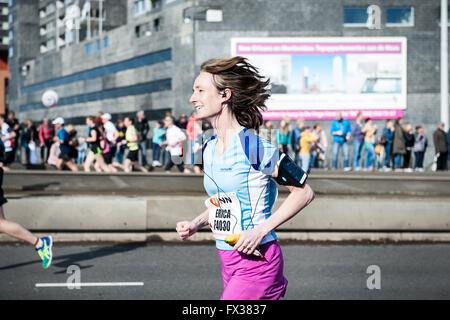 Rotterdam, The Netherlands. 10th Apr, 2016. Participants run on the Erasmus bridge during the Rotterdam Marathon, Kenyan Marius Kipserem won the race in personal best 2 hours, 06 minutes and 10 seconds edging out last year's winner Ethiopian Solomon Deksisa. In the women’s contest, Sutume Asefa Kebede went out fast, covering the first 5km in 16:53, a massive 46 seconds ahead of her pursuers and on 2:18 pace. But disaster struck the leader after 30km when she was hit with stitch. Credit:  Romy Arroyo Fernandez/Alamy Live News Stock Photo