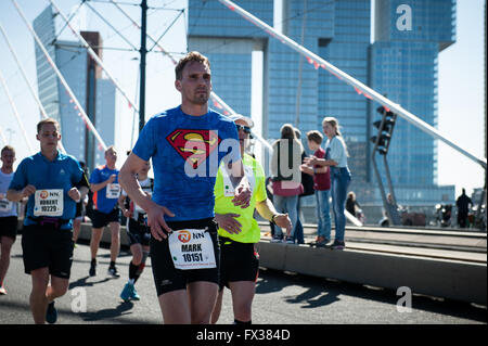 Rotterdam, The Netherlands. 10th Apr, 2016. Participants run on the Erasmus bridge during the Rotterdam Marathon, Kenyan Marius Kipserem won the race in personal best 2 hours, 06 minutes and 10 seconds edging out last year's winner Ethiopian Solomon Deksisa. In the women’s contest, Sutume Asefa Kebede went out fast, covering the first 5km in 16:53, a massive 46 seconds ahead of her pursuers and on 2:18 pace. But disaster struck the leader after 30km when she was hit with stitch. Credit:  Romy Arroyo Fernandez/Alamy Live News Stock Photo