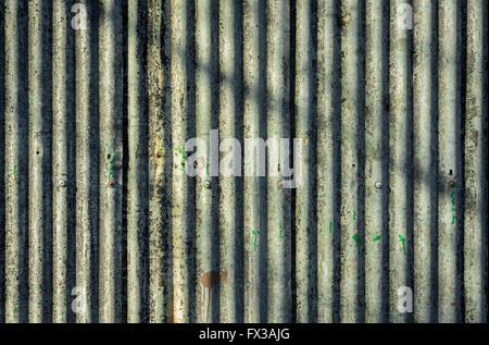 Corrugated wrinkled gray grey iron zinc surface background Stock Photo