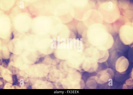 Vintage toned blurred picture of a water drops on window, abstract background. Stock Photo