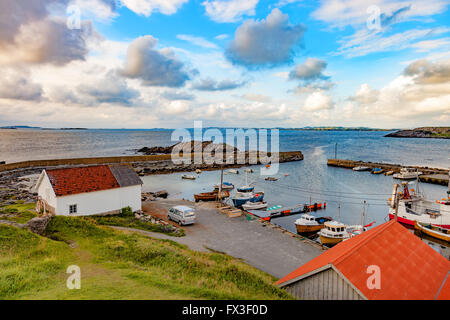 Fishing boats in small harbor on Norway. Stock Photo