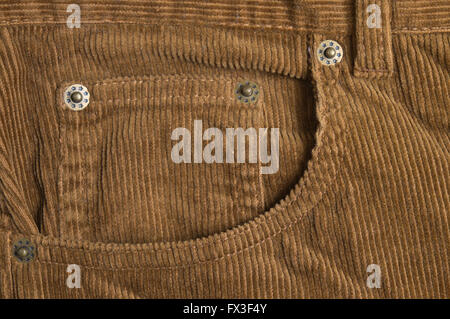 Brown bombazine pants close up detail. Fashion, textures and backgrounds Stock Photo