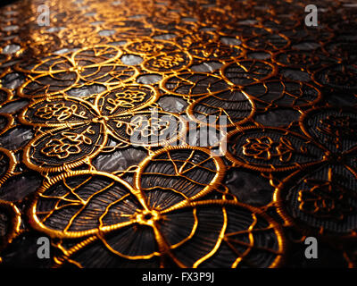 Textured cloth from patterns of gold color. Stock Photo