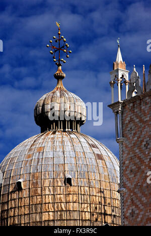 One of the domes of the Basilica di San Marco, Venezia (Venice), Italy. To the right small part of the wall of Palazzo Ducale. Stock Photo