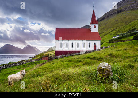 Kalsoy church in Faroe Islands whit sheep Stock Photo