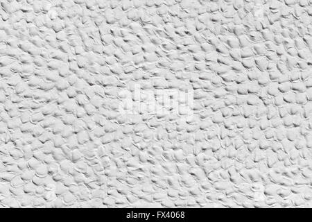 White plasterwork with humpy surface Stock Photo