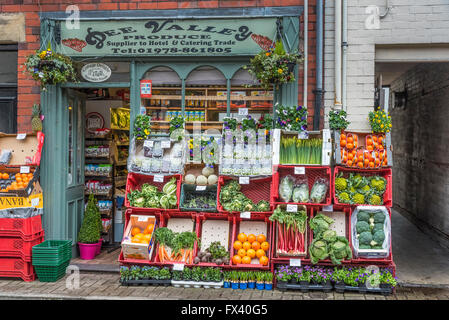 Llangollen Denbighshire. Fruit and vegetable display outside on pavement greengrocer shop. Stock Photo