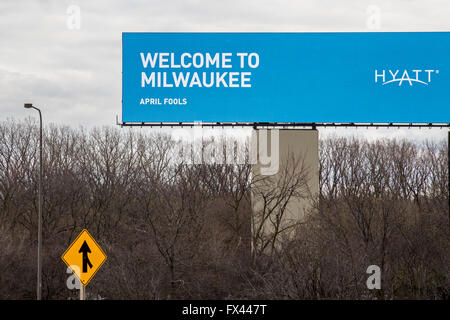 Chicago, Illinois - A Hyatt Hotel billboard welcomes travelers to Milwaukee as they arrive at O'Hare Airport on April 1. Stock Photo