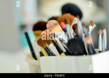 Many brushes for makeup in natural light Stock Photo