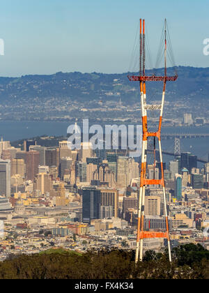 Aerial view of a telecommunications tower overlooking the city skyline ...