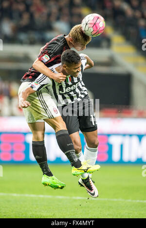 Milan, Italy. 9th Apr, 2016. Keisuke Honda (Milan), Alex Sandro (Juventus) Football/Soccer : Italian 'Serie A' match between AC Milan 1-2 Juventus at Stadio Giuseppe Meazza in Milan, Italy . © Enrico Calderoni/AFLO SPORT/Alamy Live News Stock Photo