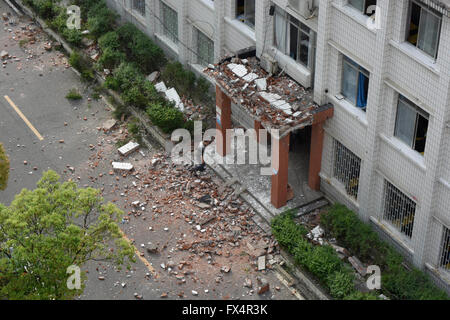 Qiandongnan. 11th Apr, 2016. Photo taken on April 11, 2016 shows the accident site after a wall collapsed at the Affiliated High School of Kaili University in Kaili City, Qiandongnan Miao and Dong Autonomous Prefecture, southwest China's Guizhou Province. One student was killed and four others were injured in the accident. Credit:  Xinhua/Alamy Live News Stock Photo