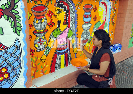 (160411) -- DHAKA, April 11, 2016 (Xinhua) -- A fine arts student of the art institute of Dhaka University paints on the wall ahead of the upcoming Bengali New Year in Dhaka, Bangladesh, April 11, 2016. Bangladeshi people will celebrate Bengali New Year on April 14 this year. (Xinhua/Shariful Islam) Stock Photo