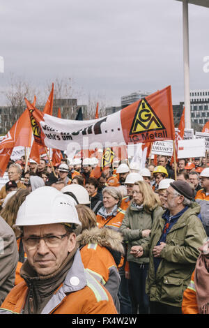 Berlin, Germany. 11th Apr, 2016. Protesters during nationalwide Steel Day of Action by the IG Metall union in Berlin. Thousands of German steelworkers take to streets under the motto 'Steel is the Future' demanding job guarantees in front of the German Federal Chancellery. Credit:  Jan Scheunert/ZUMA Wire/Alamy Live News Stock Photo