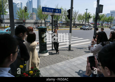 Shanghai, Shanghai, CHN. 11th Apr, 2016. Shanghai, CHINA - April 10 2016: (EDITORIAL USE ONLY. CHINA OUT) Last friday famous singer Luhan of EXO posted a picture on Weibo showing himself with a mailbox at Hankou Road in the Bund. This mailbox soon became a new tourist attraction and many fans come to queue to take a picture with it. © SIPA Asia/ZUMA Wire/Alamy Live News Stock Photo