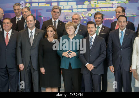 Berlin, Germany. 12th Apr, 2016. Chancellor Angela Merkel (CDU) standing next to Mexican President Enrique Pena Nieto at the chancellery before a lunch with representatives of the economy in Berlin, Germany, 12 April 2016. Merkel met Enrique Pena Nieto for bilateral talks. PHOTO: MICHAEL KAPPELER/dpa/Alamy Live News Stock Photo