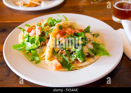 These fish tacos are a healthy alternative while eating or dining out at a restaurant. Stock Photo