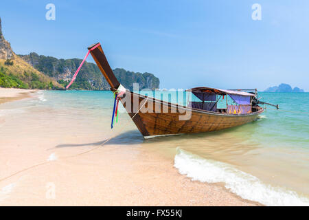 Traditional long-tail boat on the Ao Nang beach, Krabi, Thailand Stock Photo