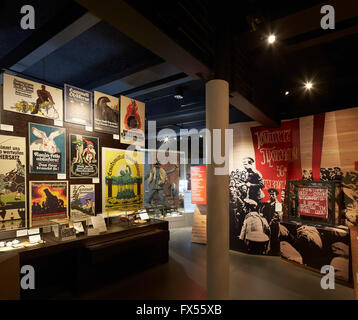 War posters and wall graphics of the time. Imperial War Museum, London, United Kingdom. Architect: Casson Mann, 2015. Stock Photo
