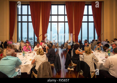 A reception in the ambassador function room of the Biarritz municipal casino (France). Picture windows which open onto the sea. Stock Photo