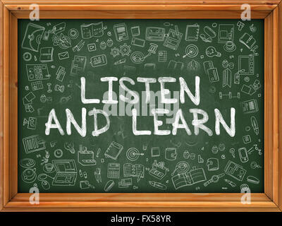 Listen And Learn - Hand Drawn on Green Chalkboard. Stock Photo