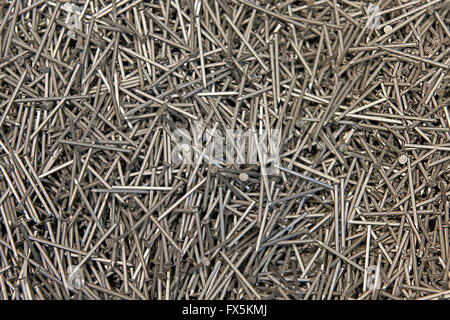 Closeup image of a big pile of galvanized nails Stock Photo