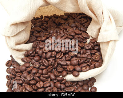 Closeup image of coffee beans in a white canvas bag Stock Photo