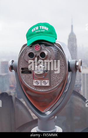 Coin operated binoculars on the observation deck of Rockefeller Center, New York City, United States of America. Stock Photo