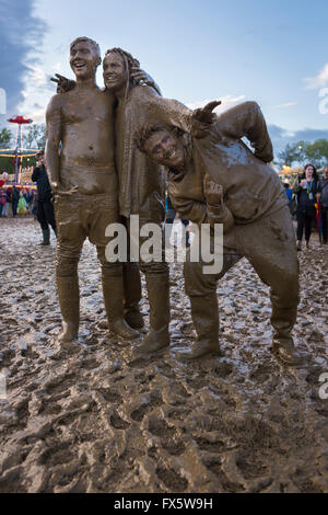 Friends mud wrestling at the 2015 Womad festival, Malmesbury, UK Stock ...