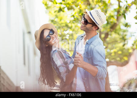 Happy young couple dancing Stock Photo