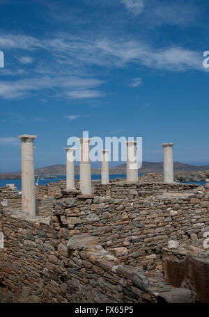 Pillars and ruin walls, Delos, Cyclades, Greece Stock Photo