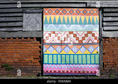 Colourful Aztec pattern painted garage door. Glastonbury, Somerset, England Stock Photo