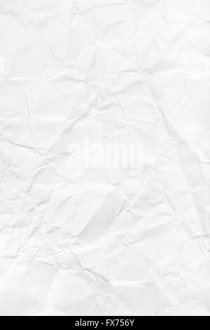 vertical background from white crumpled paper close up Stock Photo