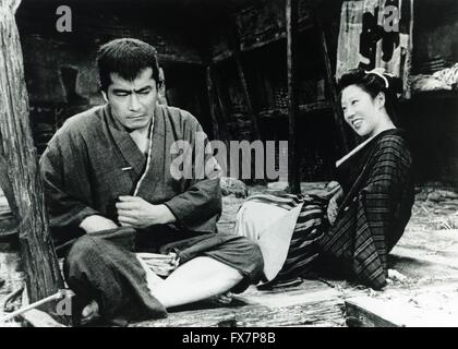 Donzoko The Lower Depths Year : 1957 Japon Director : Akira Kurosawa Toshiro Mifune, Kyoko Kagawa Stock Photo