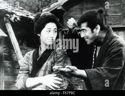 Donzoko The Lower Depths Year : 1957 Japon Director : Akira Kurosawa Toshiro Mifune, Kyoko Kagawa Stock Photo