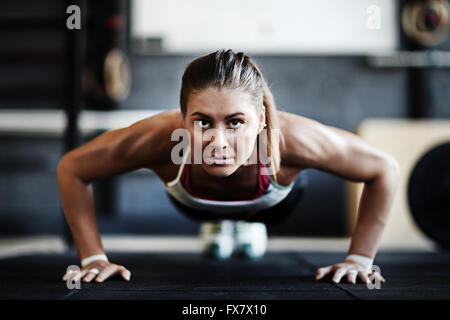 Doing push-ups Stock Photo