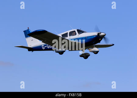 Piper PA-28-180 Cherokee in flight at Netherthorpe Airfield Stock Photo