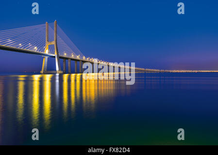 Portugal, Lisbon: Nocturnal view of Vasco da Gama Bridge Stock Photo