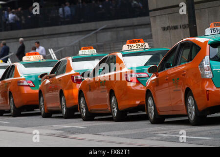 Beck taxi cars are lined up on a street in Toronto, Ont., on July. 29, 2015. Stock Photo