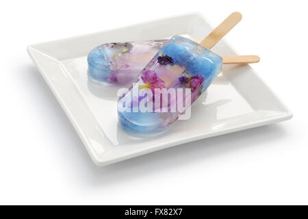 homemade edible flower ice pop, popsicle isolated on white background Stock Photo