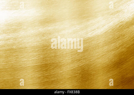 Shiny yellow leaf gold foil texture background Stock Photo